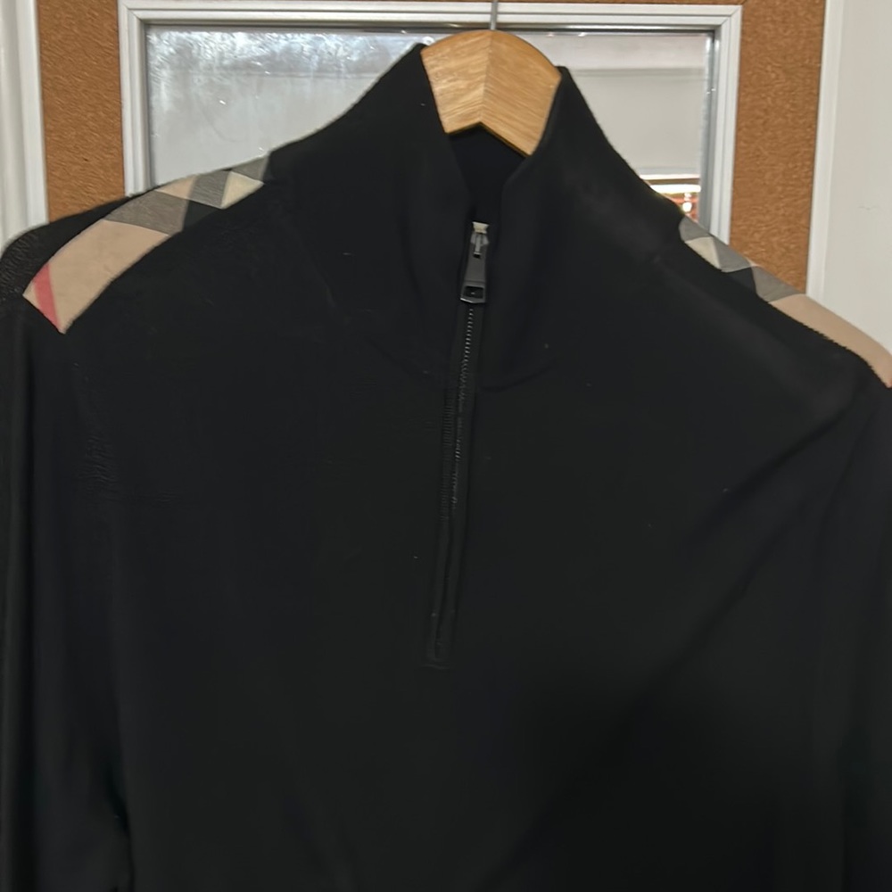 Burberry zip up sweater.